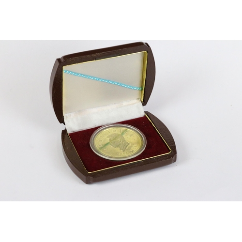 188 - Chinese proof coin, gilt metal commemorating 100 years of Lu Xun (1881-1981) in wooden box with card... 