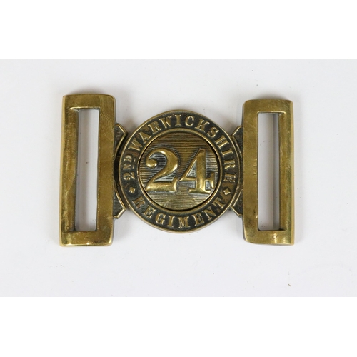 192 - Victorian regimental brass belt buckle of 24th (2nd Warwickshire) Foot together with 24th Foot brass... 