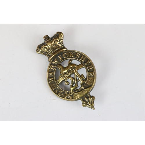 192 - Victorian regimental brass belt buckle of 24th (2nd Warwickshire) Foot together with 24th Foot brass... 