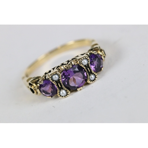 227 - 9ct yellow gold amethyst and seed pearl ring