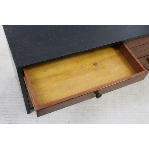 552 - Vintage table top bank of eight mahogany drawers