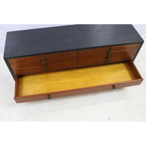 552 - Vintage table top bank of eight mahogany drawers