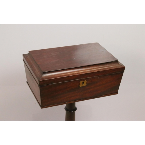 592 - 19th century teapoy with lift up lid revealing three caddy spaces supported on a turned and carved c... 