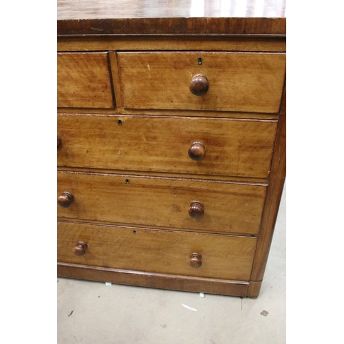 598 - Mahogany veneered tall chest of drawers with two short and three long drawers, with wooden handles, ... 