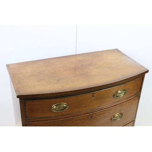 604 - Mahogany bow front chest of drawers with three long drawers and bird motif handles on raised legs, H... 