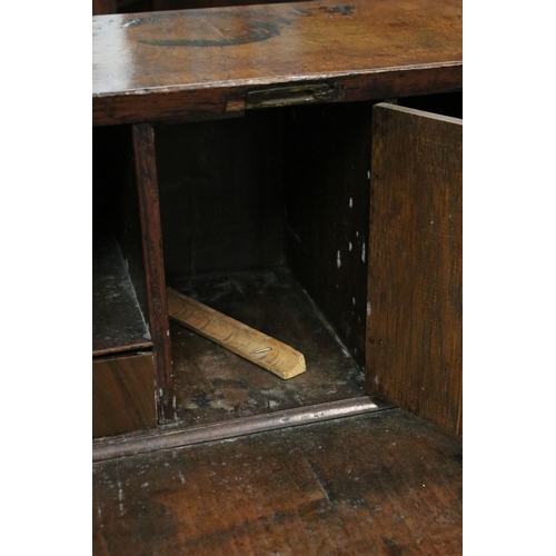 617 - Antique walnut writing bureau with fold down opening revealing eight drawers, four pigeon holes and ... 