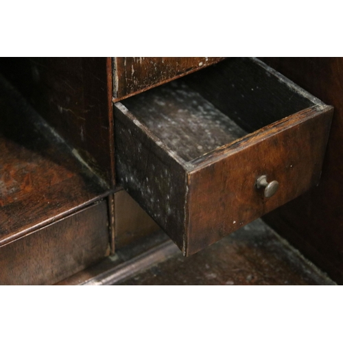 617 - Antique walnut writing bureau with fold down opening revealing eight drawers, four pigeon holes and ... 