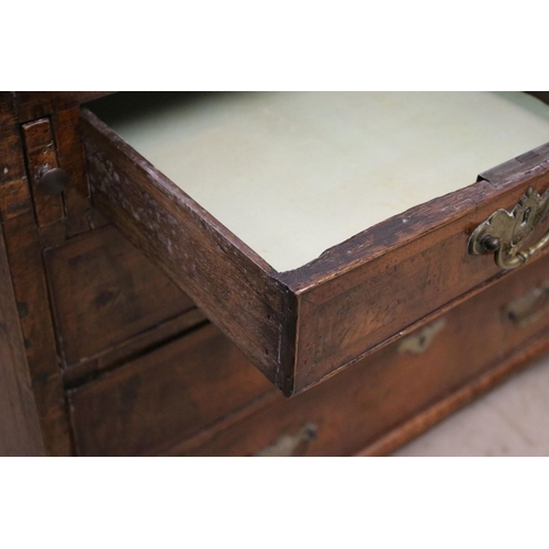 617 - Antique walnut writing bureau with fold down opening revealing eight drawers, four pigeon holes and ... 