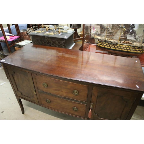 624 - Large mahogany side board with carved detail edges on raised square legs with two cupboards and two ... 