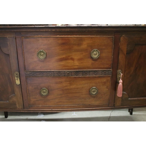 624 - Large mahogany side board with carved detail edges on raised square legs with two cupboards and two ... 