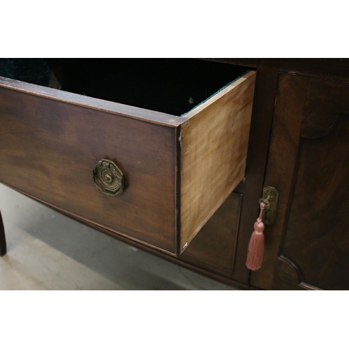 624 - Large mahogany side board with carved detail edges on raised square legs with two cupboards and two ... 