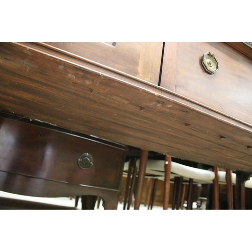 624 - Large mahogany side board with carved detail edges on raised square legs with two cupboards and two ... 