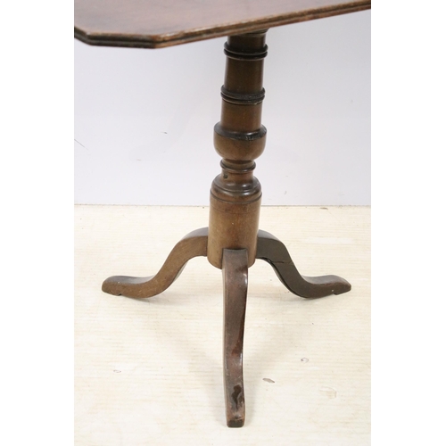 627 - Small mahogany fixed top table on tripod legs, H 73cm, W 83cm, D 62cm