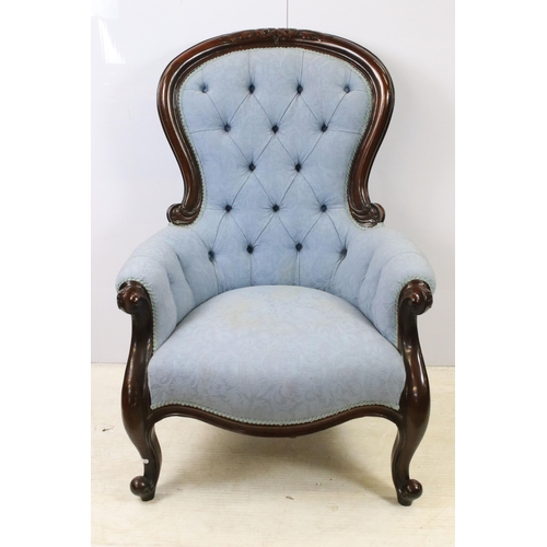 630 - Carved button back fireside gentleman's chair, shaped relief detail back, serpentine front rail, car... 