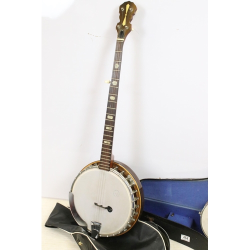 454 - Savana Ukulele banjo with four strings and decorative white metal etched back panel, in case, togeth... 