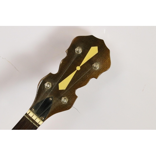 454 - Savana Ukulele banjo with four strings and decorative white metal etched back panel, in case, togeth... 