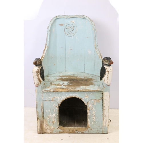 631 - 19th century painted lambing / shepherd's chair of barrel form, with carved Isle of Man symbol to ba... 