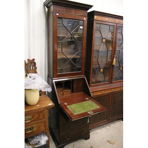 639 - 20th century mahogany four drawered veneered writing bureau bookcase with glazed front and pull down... 