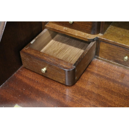 639 - 20th century mahogany four drawered veneered writing bureau bookcase with glazed front and pull down... 