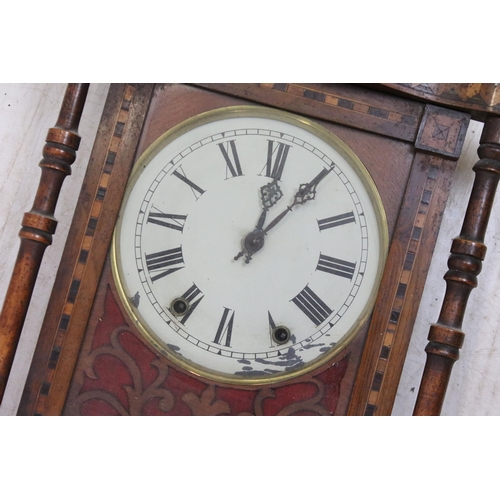 645 - Antique marquetry bordered case clock with hand carved pediment, fret work around dial, turned pilla... 