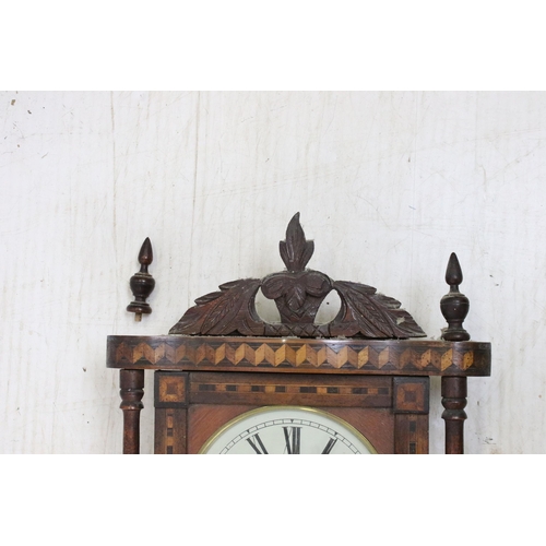 645 - Antique marquetry bordered case clock with hand carved pediment, fret work around dial, turned pilla... 