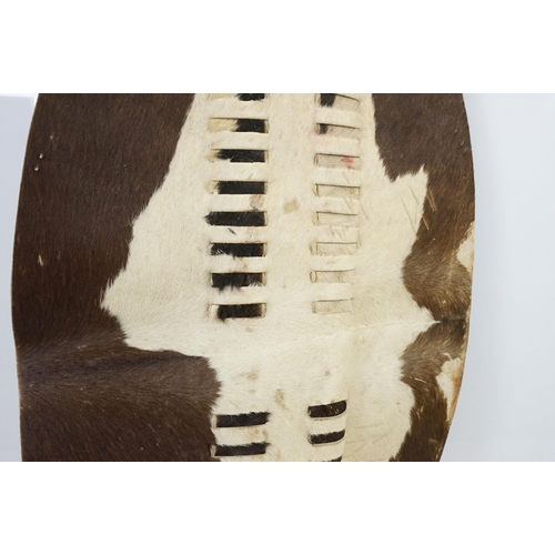 396 - African Zulu cowhide shield, H 168cm, W 66cm