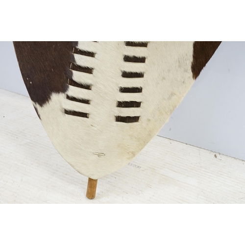 396 - African Zulu cowhide shield, H 168cm, W 66cm