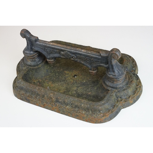 398 - Set of two Victorian cast iron boot scraper shoe cleaners, one marked 1225 to edge