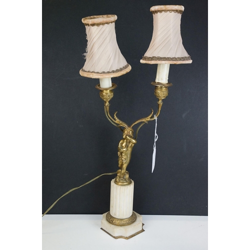 441 - Pair of 20th century gilt metal two arm cherub style table lamps with marble column bases, H 39cm