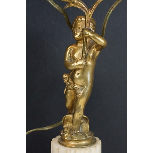 441 - Pair of 20th century gilt metal two arm cherub style table lamps with marble column bases, H 39cm