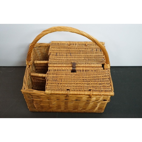 444 - Wicker picnic basket with bottle carrying compartments and fastening lidded compartment containing p... 