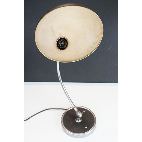 456 - Original Kaiser-Idell black enamel lamp on curved stand and circular base, approx. H 46cm