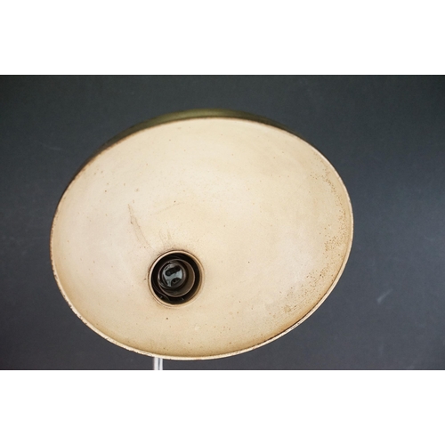 456 - Original Kaiser-Idell black enamel lamp on curved stand and circular base, approx. H 46cm