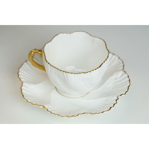 82A - Coalport white China cups and saucers with gold rim to include ten cups and sixteen saucers with ext... 