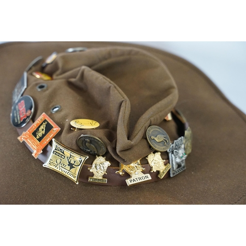 425A - Barbour waterproof hat Size L, together with a Outback hat with badges, Integral Design's Goose down... 