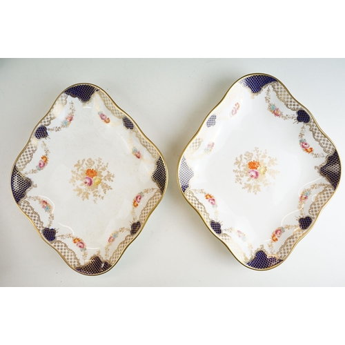 77 - Six Wedgwood serving dishes in varying shapes together with eleven plates, diameter 21cm