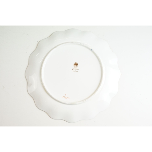 77 - Six Wedgwood serving dishes in varying shapes together with eleven plates, diameter 21cm