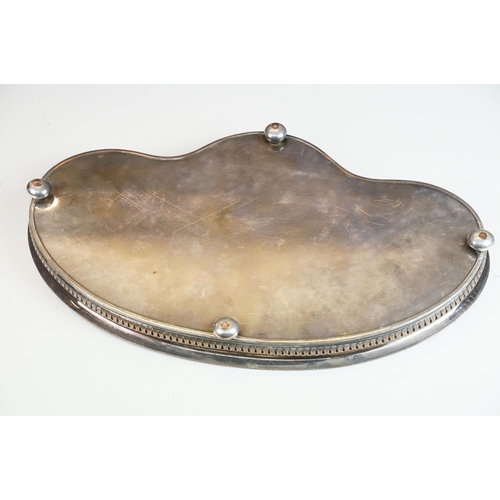 390 - Two silver plated gallery service trays, one with two handles W 47.5cm, the other resting on ball fe... 