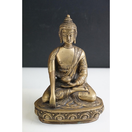 392 - Brass seated Buddha, H 17.5cm together with Krishna playing flute statue, H 30cm