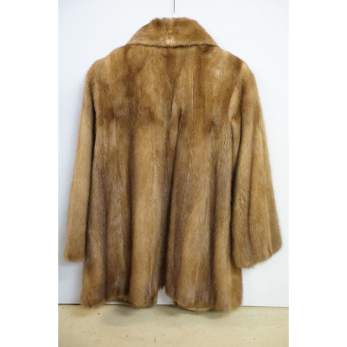 399 - Two mink jacket coats by 'Saga Mink' in size 12 and size 14 with silk and rayon lining