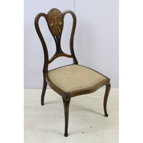 568 - Pair of detailed marquetry inlaid mahogany chairs with shaped backs and slender tapered legs, H 84cm... 