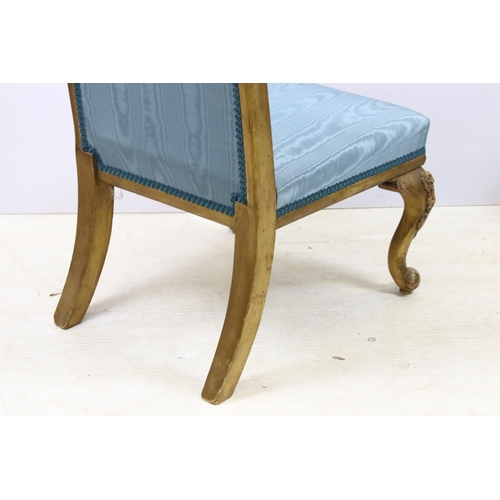 570 - Rococo French style gilded wood cane back bedroom chair with blue upholstery, H90cm together with a ... 