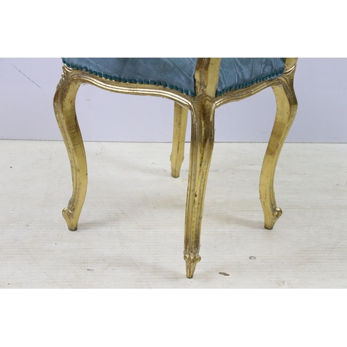 570 - Rococo French style gilded wood cane back bedroom chair with blue upholstery, H90cm together with a ... 