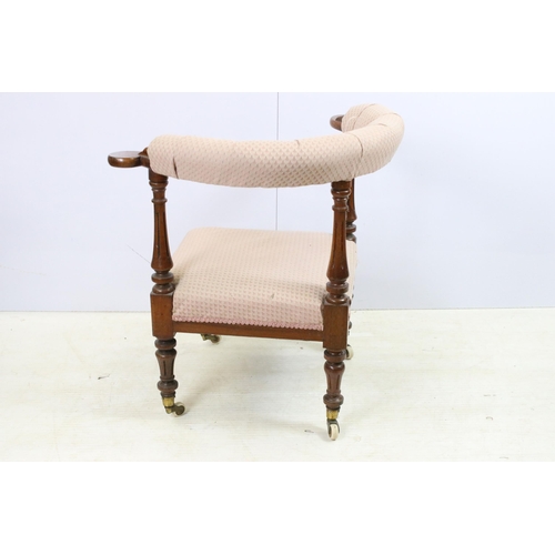 571 - Edwardian hard wood upholstered corner chair on turned legs with castors and button back detail, app... 