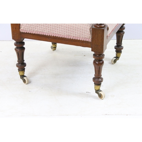 571 - Edwardian hard wood upholstered corner chair on turned legs with castors and button back detail, app... 