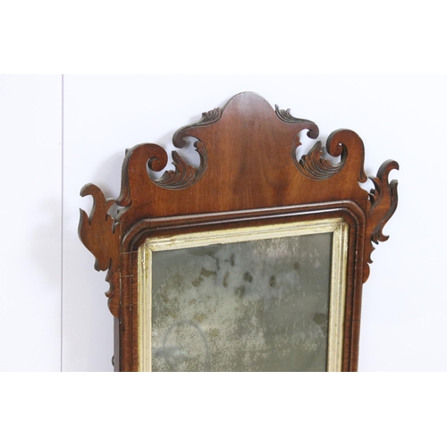 572 - Fret cut carved mirror with original distressed mirror plate, H 78cm, W 45cm