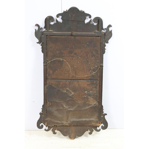 572 - Fret cut carved mirror with original distressed mirror plate, H 78cm, W 45cm