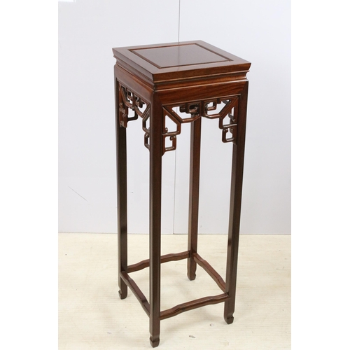 575 - Hardwood flower plant stand torcheres, one with square top and oriental carved decoration, one round... 