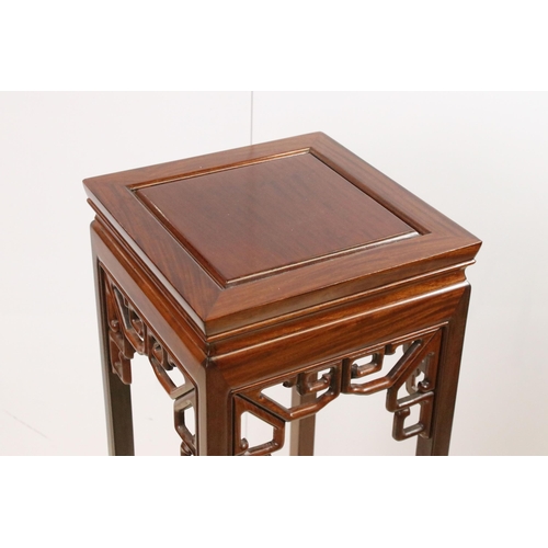 575 - Hardwood flower plant stand torcheres, one with square top and oriental carved decoration, one round... 