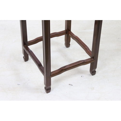 575 - Hardwood flower plant stand torcheres, one with square top and oriental carved decoration, one round... 